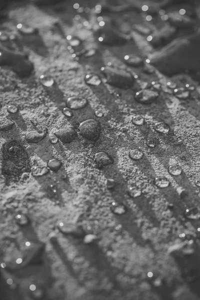 Vatten eller regn droppar på grå markyta — Stockfoto