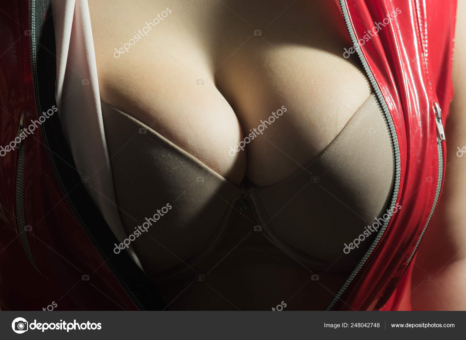 XXL and XL breast size. sexy chest of woman. mammologist. Plastic Surgery.  Woman with big natural sexy boobs. silicone implants. healthcare. Sexy boob.  Breast cancer. Willing to be the first. Stock Photo
