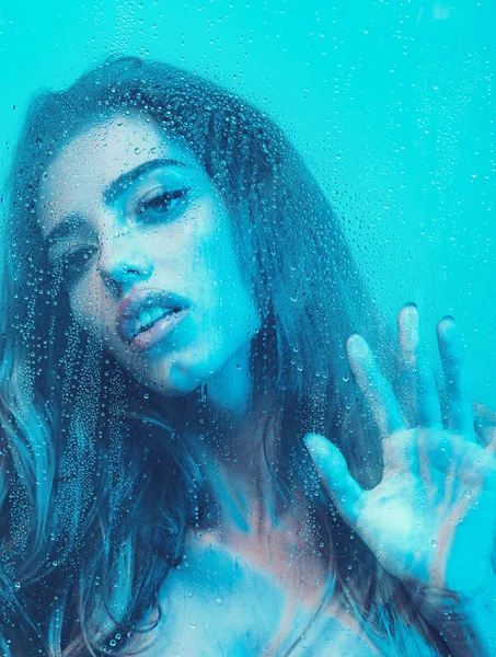 stock image Beautiful Woman Taking a Hot Shower focus on face.