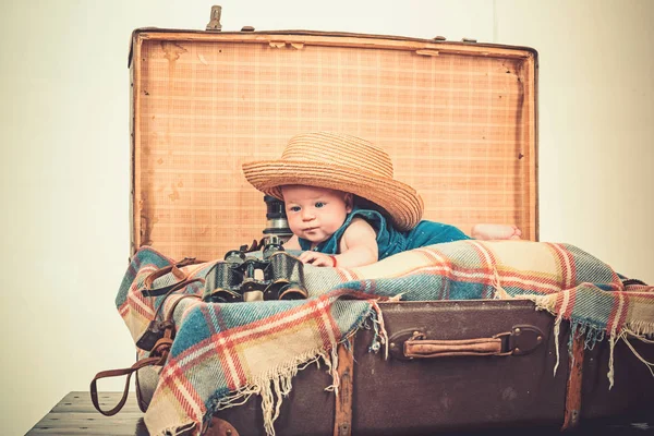 Very busy. Sweet little baby. New life and birth. Childhood happiness. Photo journalist. Small girl in suitcase. Traveling and adventure. Family. Child care. Portrait of happy little child — Stock Photo, Image