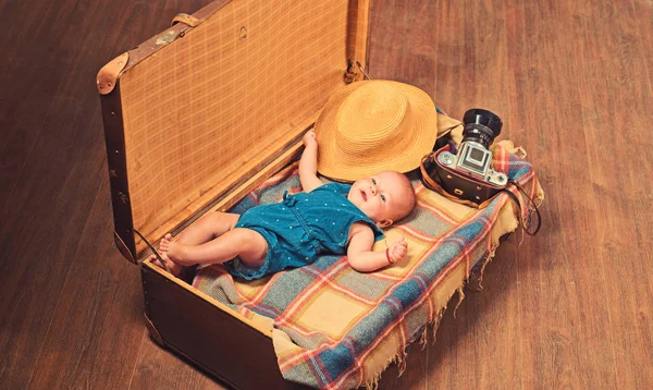 Soon you will be with us. Childhood happiness. Photo journalist. Sweet little baby. New life and birth. Family. Child care. Small girl in suitcase. Traveling and adventure. Family vacation — Stock Photo, Image