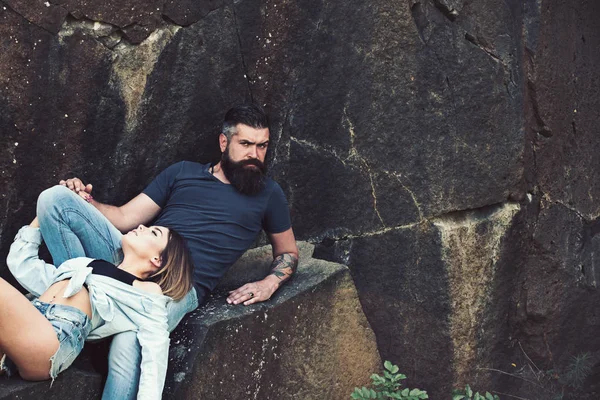 Enjoying true love. Couple in love on summer vacation. The best romantic vacation for couple. Sensual couple on vacation trip. Sexy woman and bearded man on natural landscape