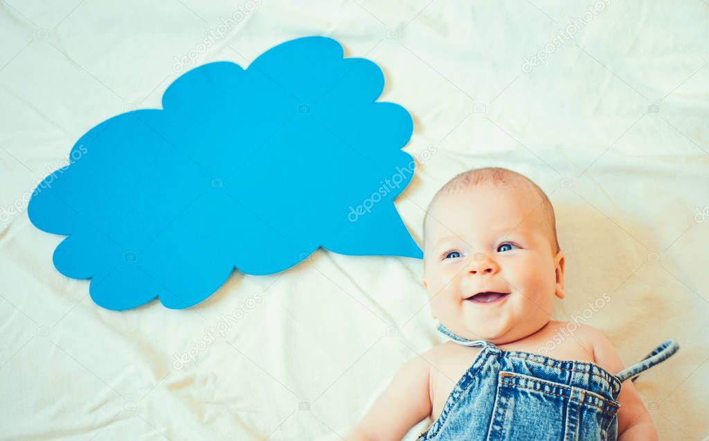 Family firstly. Sweet little baby. New life and birth. Small girl. I can speak. Word in cloud. Family. Child care. Childrens day. Portrait of happy little child. Childhood happiness