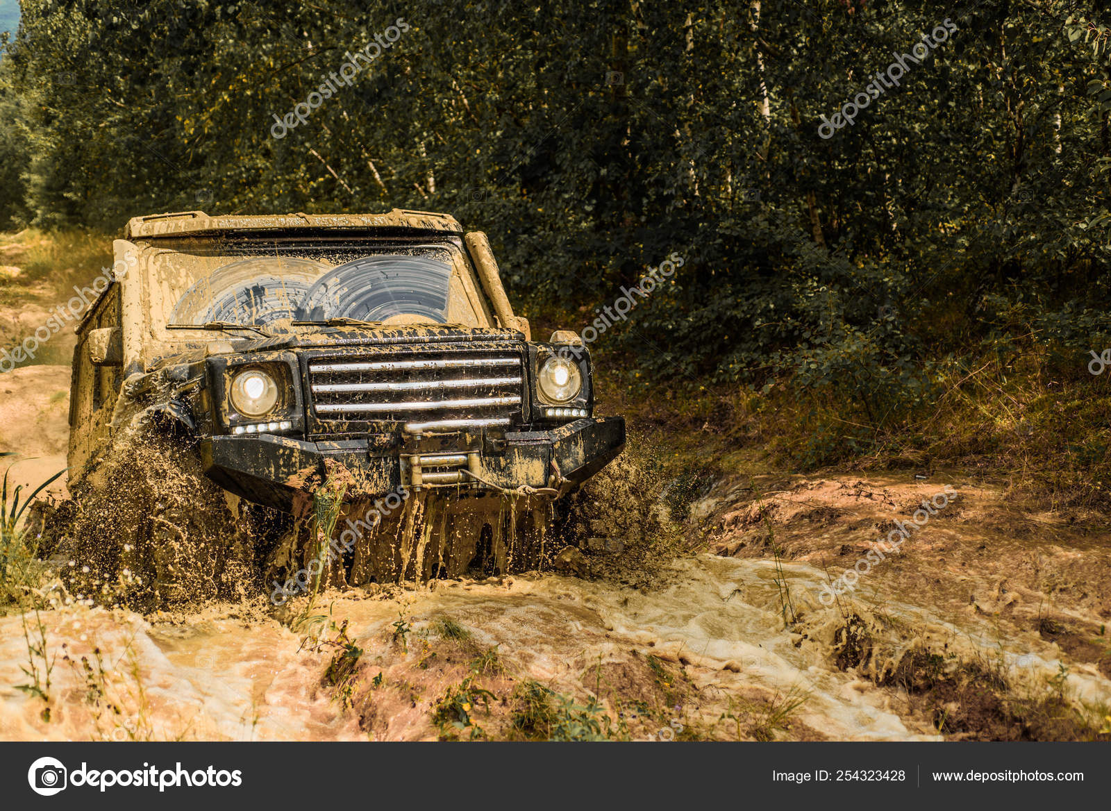 Jeep Crashed Into A Puddle And Picked Up A Spray Of Dirt Off Road