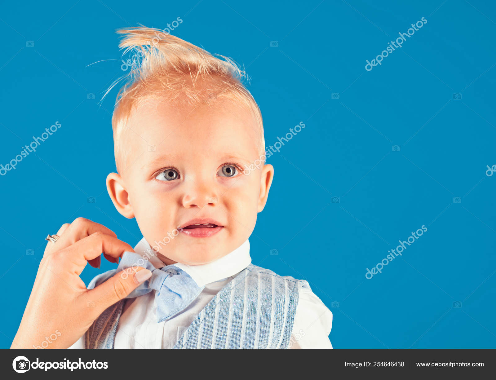 My hair my look. Boy child with stylish blond hair. Little child with messy  top haircut. Little child with short haircut. Healthy haircare tips for  kids. Haircare products, copy space Stock Photo
