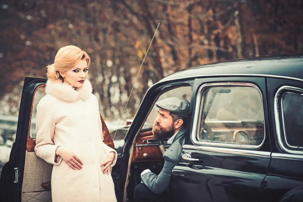 meeting of woman in fur coat and bearded man. meeting and date of couple in love