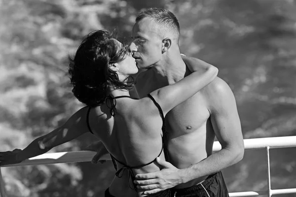 Young couple enjoying each other at water trail — Stock Photo, Image