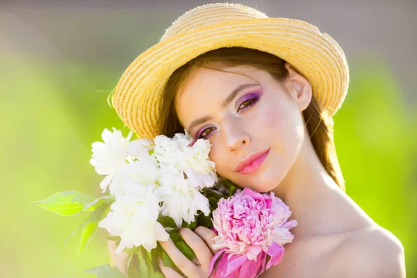 Spring woman. Springtime and vacation. face and skincare. Travel in summer. Woman with fashion makeup. Natural beauty and spa therapy. Summer girl with long hair. Skincare