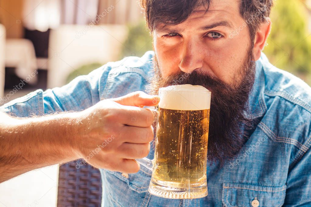 Senior man drinking beer. Beer time. Retro advertising of alcoholic beverages. Retro man with a beer.