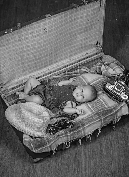 Nice moment. Portrait of happy little child. Sweet little baby. New life and birth. Family. Child care. Small girl in suitcase. Traveling and adventure. Childhood happiness. Photo journalist