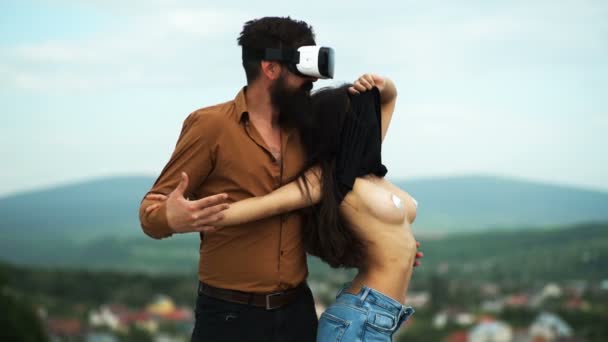 Play cybersex game. Man touch sexy naked erotic breasts virtual girl. Explore cybersex. Hipster man play cybersex game hmd vr glasses. Feel realistic sensation. Cybersex realistic sensation concept. — Stock Video