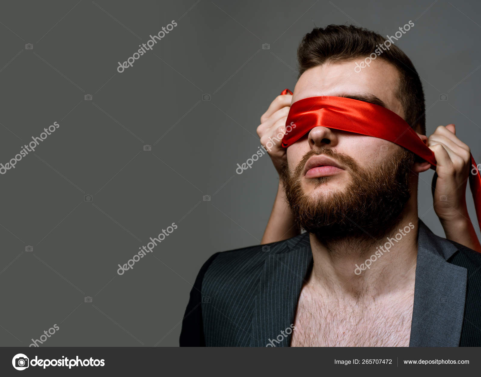 Blind Way of Life. Blindfolded Man with Tie on Eyes in White Shirt