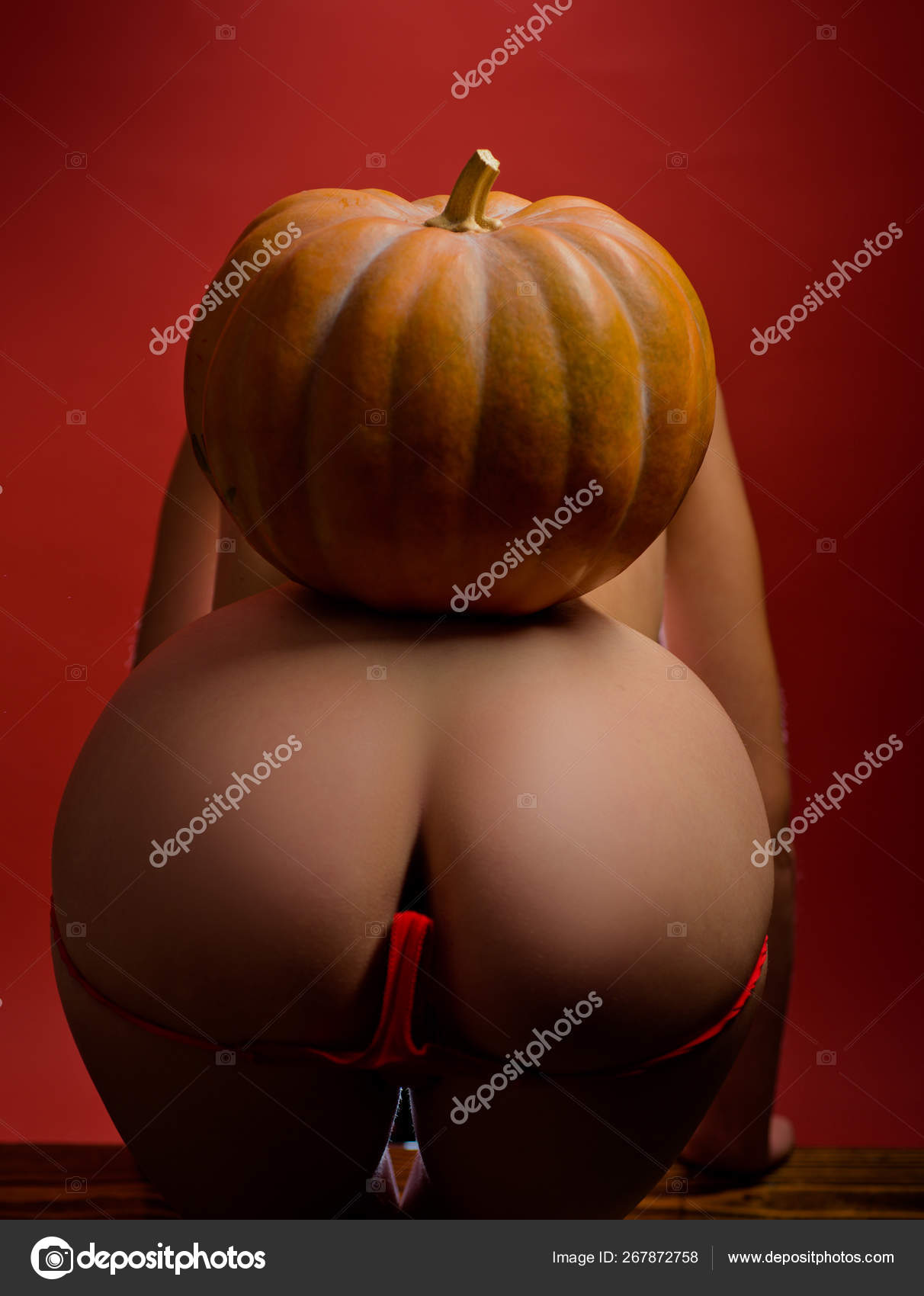 Female with sexy ass posing. Pose for sex and kamasutra concept. Love position sensual woman. Anal sex and female orgasm. Sale on sex shop. Sexual costume photo