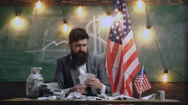 Bearded man with dollar money for bribe. American education reform at school in july 4. Independence day of usa. Economy and finance. Patriotism and freedom. Income planning of budget increase policy. — Stock Video