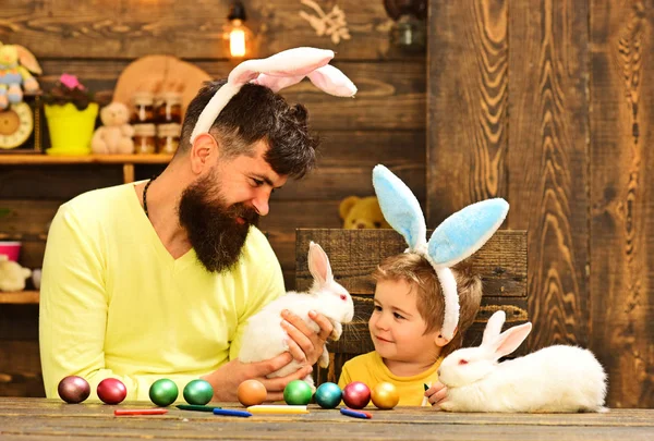 Easter family with fake bunny ears.