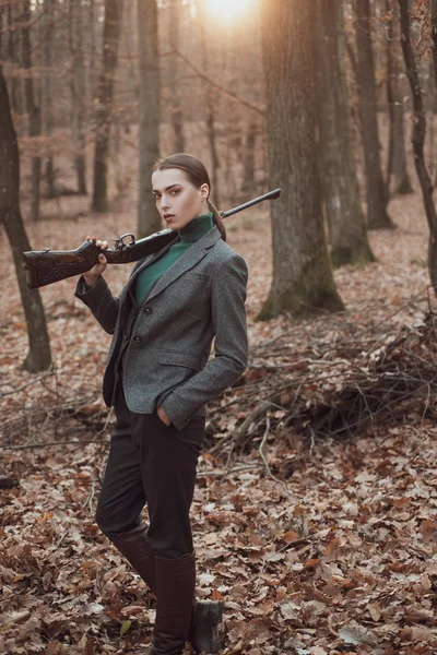 successful hunt. hunting sport. girl hunter in forest. girl with rifle. chase hunting. Gun shop. military fashion. achievements of goals. woman with weapon. Target shot. Hunting period, autumn season