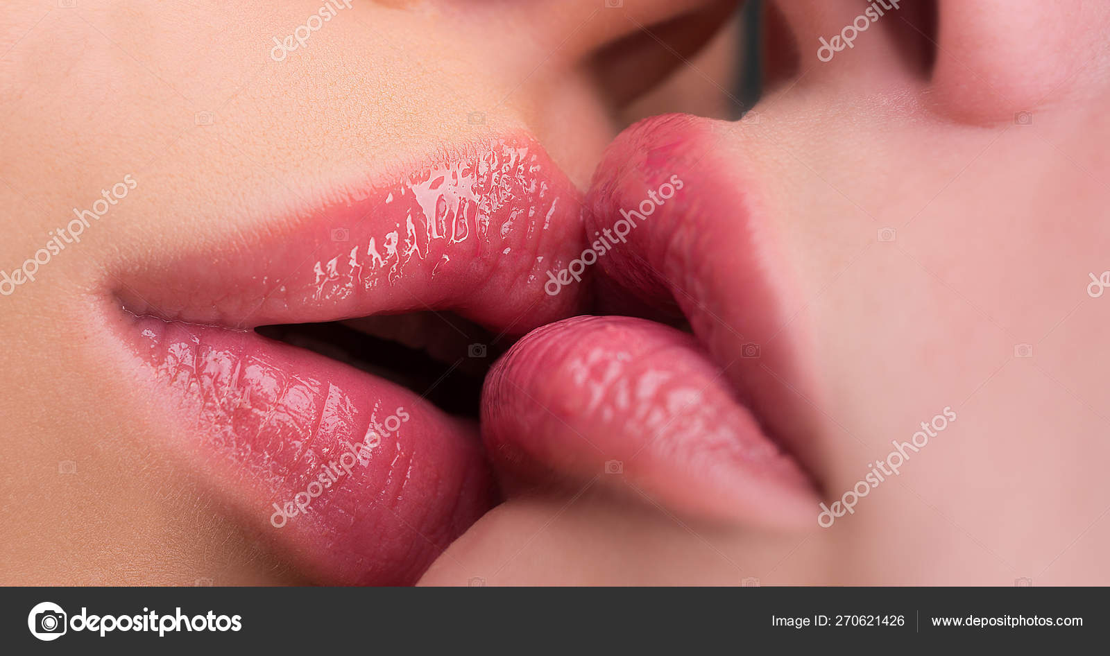 Lesbian kiss. Lesbian pleasures. Oral pleasure. Couple girls kissing lips close up. Sensual touch kissing sexual activity. Hot foreplay. Lip care