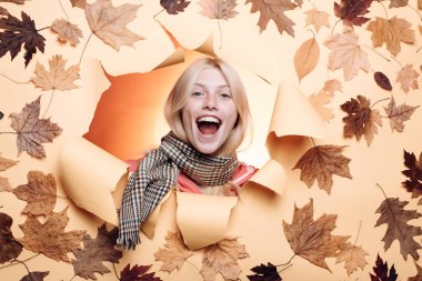 Woman happy autumn in autumn park. Autumn mood and the weather are warm and sunny and rain is possible. Leaf fall. Autumn discounts on lingerie. Sale of womens panties. Fashion girls.