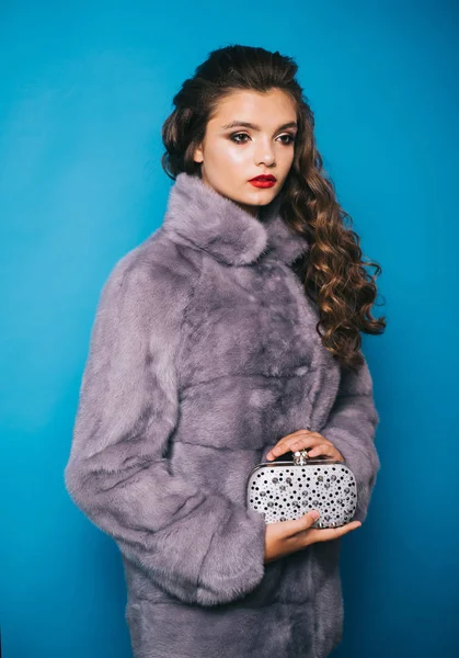 With her feminine chic style. Pretty woman in fashionable fur coat. Fashion model wear luxurious fur. Winter fashion trends. Young woman wear elegant winter coat. Perfect for winter cold