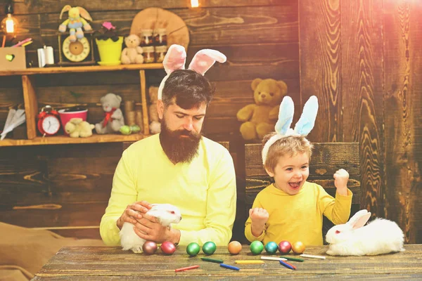 Easter family with fake bunny ears.