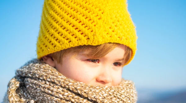 Happy new year and merry christmas. Happy winter child snow background. Cute boy in winter clothes hat and scarf close up. Winter fashion. Winter holidays concept. May you have wonderful holiday — Stock Photo, Image