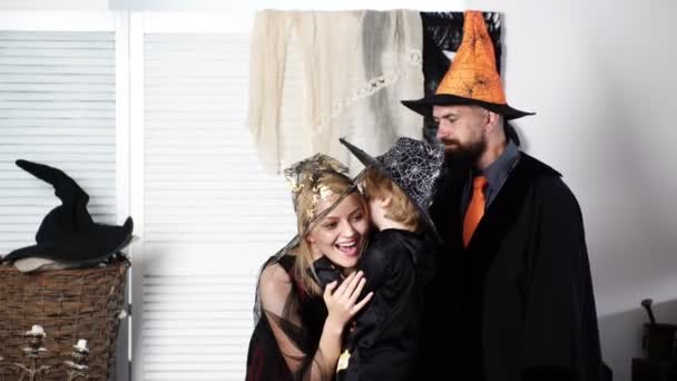 Happy family in costumes getting ready for halloween. Fun time in Halloween. Halloween party for happy family. Halloween background. Funny family. Best ideas. Secrets of Magic. Terrible holiday. — Stock Video