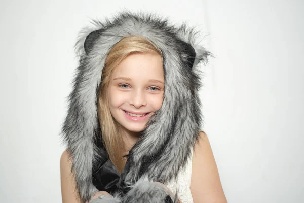 Small fashionista. Small girl wear winter hat scarf. Winter fashion trends for kids. Happy child smile in fashion style. little girl in winter cap with plush bear ears and soft paws. i love winter — Stock Photo, Image