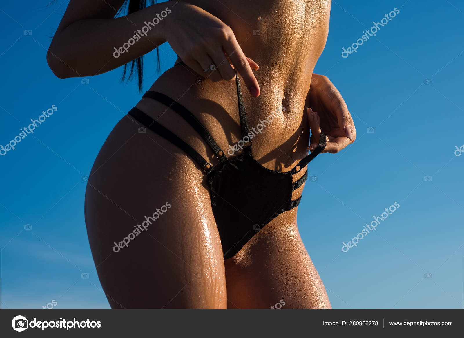 Big sexy sandy buttocks. Luxury ass. Beautiful female butt. Woman lingerie. Beautiful woman body. Sexy girl with big image