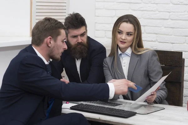 Business partners or businessmen at meeting, office background. Business consulting concept. Business negotiations, discuss conditions of deal. Woman lawyer or accountant consulting entrepreneurs