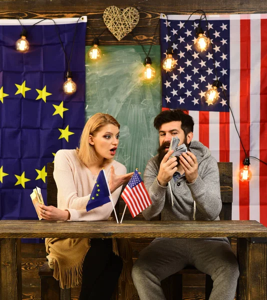 contract negotiation and business regulation. Economic partnership and finance. bearded man and woman politician at conference. foreign policy conflict. Partnership between usa and european union