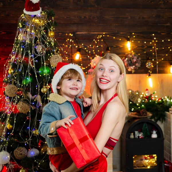 Family love. Mother and baby son celebrate christmas at home. Winter holidays concept. Magic atmosphere family holidays. Parenthood joy. Motherhood child care. Spend holiday time with closest — Stock Photo, Image