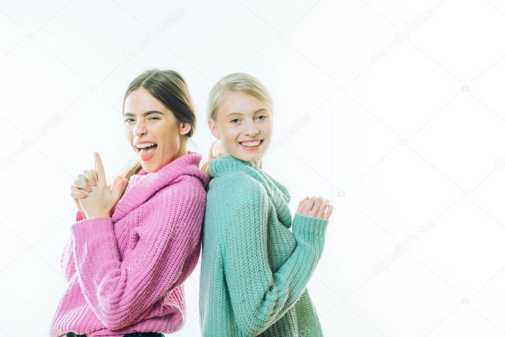 Add some action to your life. happy girls in knitted wear. sweater weather. warm clothes. knit. cashmere. friendship family. happy to be together. handmade and diy. knitwear collection. copy space