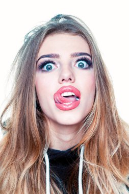 Portrait of a funny hipster girl looking at camera over white background. Comic woman. Close up portrait of surprised and funny woman. clipart