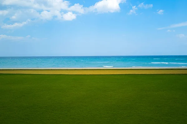 Vacation land for holiday. Luxury place for beach house with sea view. Lounge grass floor. — Stock Photo, Image