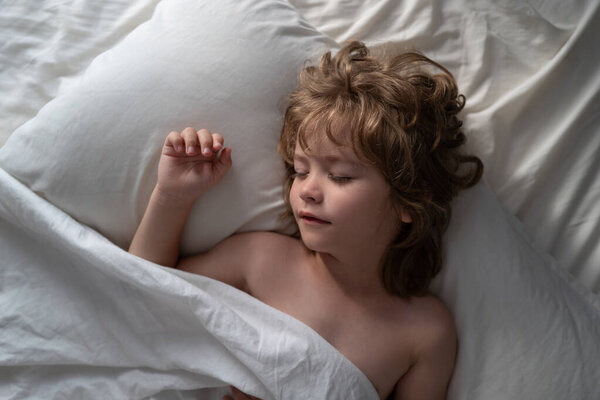 Kids sleeping, top view. Sweet sleep child.