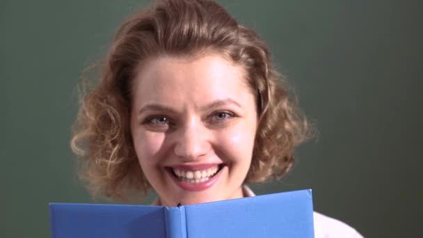Happy teacher or young student closeup portrait. — Stock Video