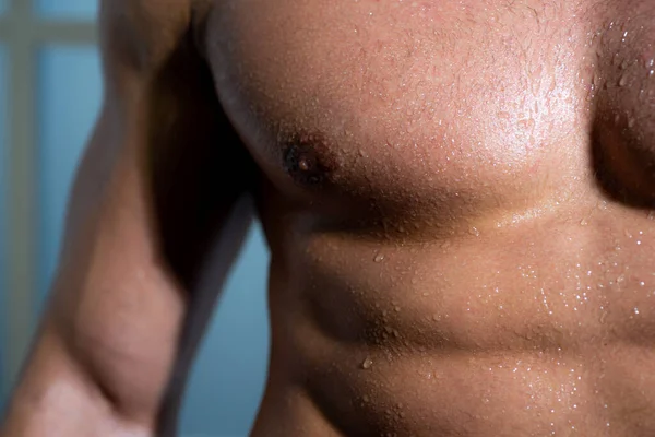 Sexy torso of a muscular male model. Guy with sexy body. Chest, breast of muscular man. Close up mens nipple. — Stock Photo, Image