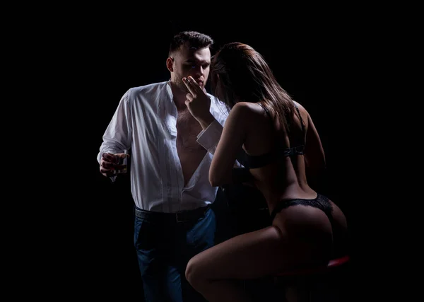 Rich man whispering young lover in underwear, sensuality and desire. Lingerie black. — Stock Photo, Image