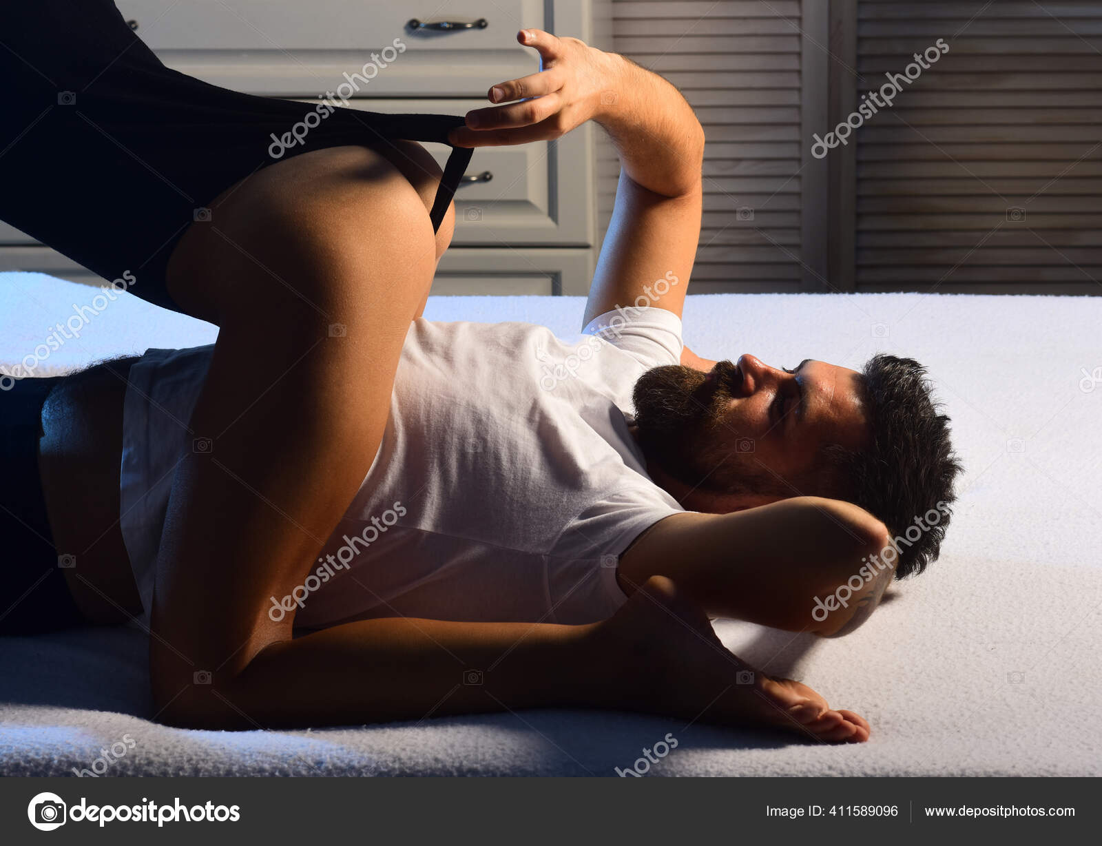 couple having sex in woman-on-top position Wild sex with sexy female. Classic sex positions. Woman in lace erotic  lingerie kissing attractive guy.