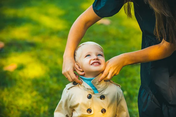 Fashion portrait of cute child on city park. — Stock Photo, Image