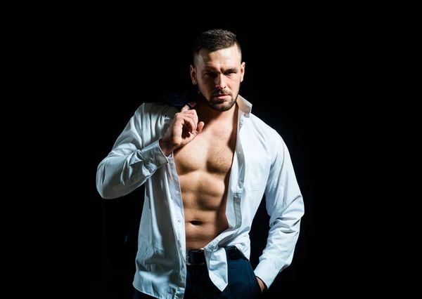 Man undressed shirt. Sexy man with muscular body and bare torso. — Stock Photo, Image