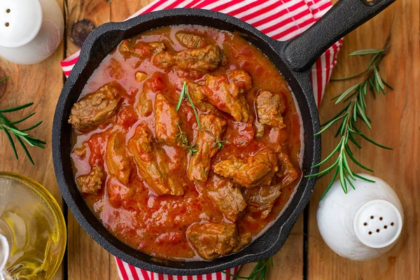 Beef stew with tomato sauce and cream and rosemary — Stock Image Beef Stew Tomato Sauce Cream Rosemary Stock Picture