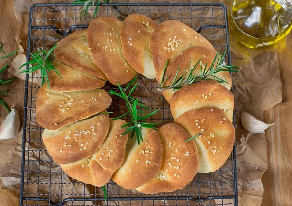 Serbian leavened pull apart bread pogaca with sesame seeds