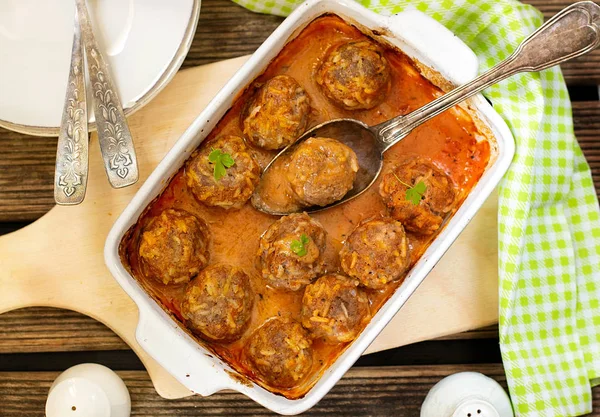 Healthy baked meatballs with rice in tomato sauce — Stok fotoğraf
