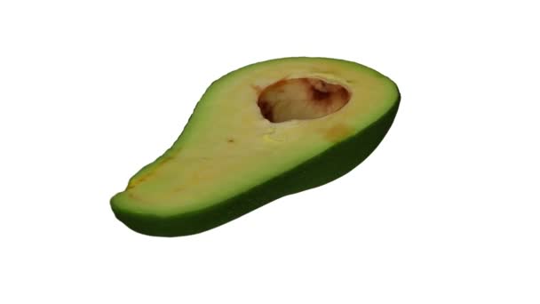 Realistische Darstellung Einer Rotierenden Grünen Florida Avocado Halbiert Auf Weißem — Stockvideo