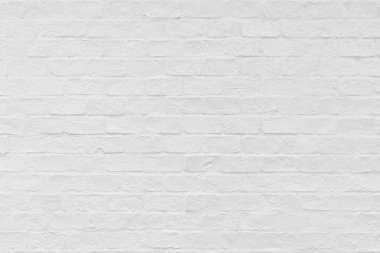 Doku ve arka plan beyaz tuğla duvar.