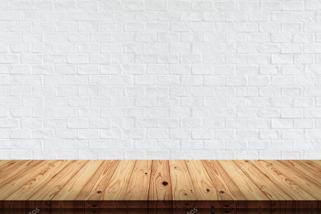 Empty top wood table with white brick wall texture and background.