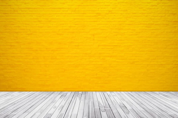 黄色のレンガの壁の模様の木の床の背景を持つテクスチャー — ストック写真