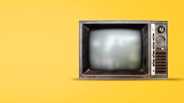 Old wooden television or vintage tv on yellow background.