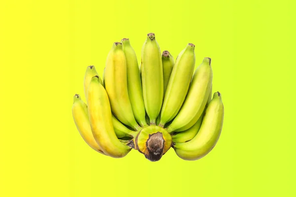 Banány na zeleném a žlutém pozadí. — Stock fotografie